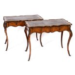 A pair of Louis XVI style kingwood bureau plats, with brass Rococo style mounts, the shaped