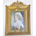 A portrait miniature, of a lady wearing a bonnet, inscribed Mrs Siddons, 13.5 x 9.5 cm, in an ornate