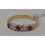 A 9ct gold five stone ruby and diamond ring, approx. ring size P Modern