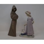 A Lladro group, Pulling Dolls Carriage, 5044, 26.5 cm high, and a similar matt figure, Monk, 2060,