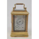 A carriage timepiece, in a brass case, 10 cm high Modern