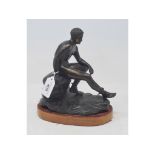 A bronze figure, Mercury, on a wooden base, 21.5 cm high