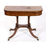 An early 19th century mahogany card table, on four slender supports and downswept legs, 92 cm wide