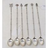 A set of six Chinese silver coloured metal spoons, boxed