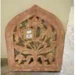 A Mughal sandstone panel, of lancet form, with floral decoration, 41 cm wide