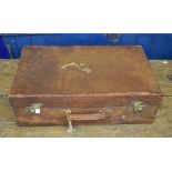 A leather suitcase, bears an Asprey label, 66 cm wide