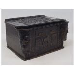 A carved oak bible box, of small proportions, decorated masks and bears date 1616, 30.5 cm wide