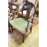 A 19th century mahogany carver chair, with a pierced splat, on downswept legs