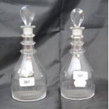 A pair of 18th century ring neck decanters and stoppers, 24 and 23.5 cm high (2) Report by GH