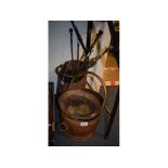 Assorted brass fire irons, a copper coal scuttle, other fireside furniture and items (qty)