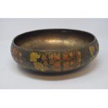 A Kashmiri lacquer and copper bowl, 33 cm diameter Report by GH General wear and tear. Surface