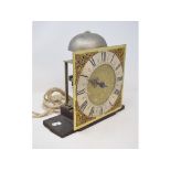A longcase clock movement, the 25.5 cm square brass dial with silver chapter ring and Roman
