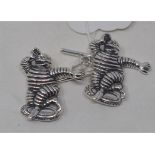A pair of novelty silver cufflinks, in the form of a Michelin type man Report by NG Modern