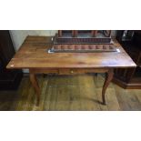 A Continental fruitwood table, with a single frieze drawer, 135 cm wide