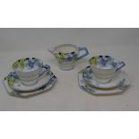 An Art Deco Paragon Iceland Poppy pattern part tea set, comprising eight cups, eight saucers, nine