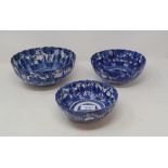 Three graduated Japanese bowls, with underglaze blue decoration, some restoration, the largest 21.