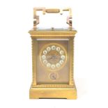 A carriage clock, with repeat, the 6.5 cm wide brass dial, signed Camerden & Forster, New York, with
