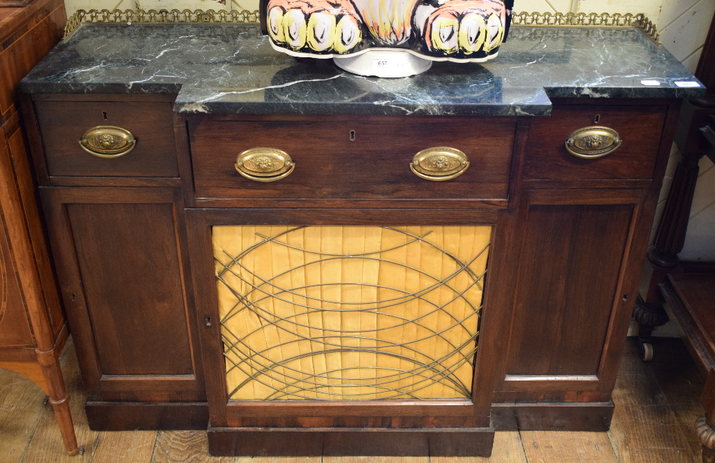 A Regency style breakfront mahogany side cabinet, the green marble top with a brass three quarter