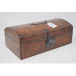 A 19th century embossed leather covered dome top box, 30 cm wide