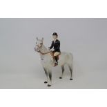 A Beswick Huntswoman, grey, 1730, restored, gloss