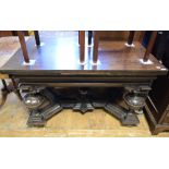 A 17th century style oak draw leaf table, the carved base with cup and cover legs, 220.5 cm wide