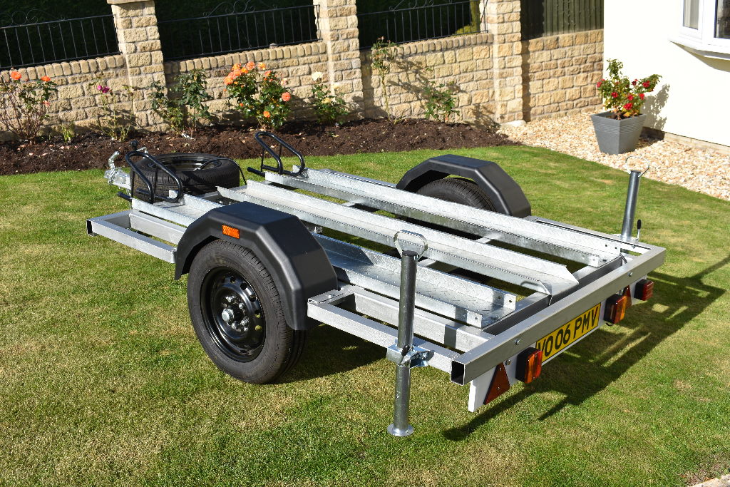 A 2018 single axle triple bike trailer. Constructed by our vendor, this trailer has seen very little