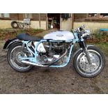 A 1991 Triton café racer, registration number Q120 BAU, aluminium/blue. Tritons are a marriage of