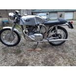 A 1956 Triton café racer, registration number TFF 450, aluminium/nickel. This well presented and
