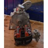 A Rudge single cylinder engine bottom end crank case and piston, mounted on a plinth, with a