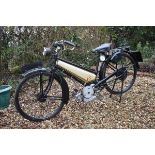 A 1940 James Autocycle 98cc, registration number DUY 594, black/bronze. The autocycle came into