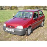 A 1995 Rover 100 Kensington, registration number M356 MHO, red. This smartly presented limited