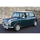 A 1994 Rover Mini Cooper 1.3 automatic, registration number M351 CRV, chassis number