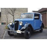 A 1936 Austin 10/4 Colwyn cabriolet, registration number CHT 279, chassis number 82329, blue over