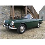 A 1968 Sunbeam Alpine Series V, registration number UPL 198F, Holly green. The Alpine was firmly