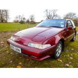 A 1995 Volvo 480 Celebration, registration number N550 GRN, red. These cars are now becoming very