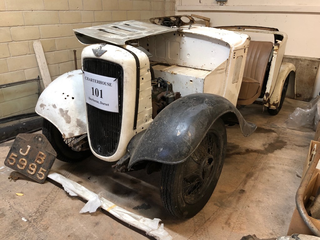 A 1935 Austin 10/4 tourer restoration project, registration number JB 5995, grey. The Austin