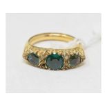 A 9ct gold, emerald and diamond ring, approx. ring size J Shank altered and resized. Approx. 3.1