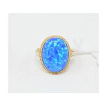 A 9ct gold and Gilson black opal ring, approx. ring size M Report by NG Modern