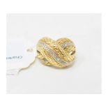 An 18ct gold and diamond knot ring, approx. ring size L, approx. 7.9 g (all in)