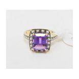 A 9ct gold, emerald cut, amethyst and seed pearl type ring, approx. ring size N½ Report by NG Modern