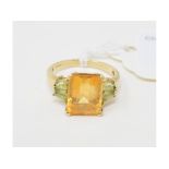 A 9ct gold, and citrine and peridot ring, approx. ring size M½ Report by NG It is approx. 3.7 g (all
