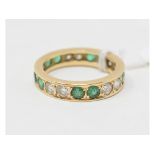 A diamond and green stone eternity ring, approx. ring size M Approx. 3.7 g (all in)