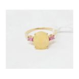 A 10ct gold, opal and pink tourmaline ring, approx. ring size P½ Report by NG It is approx. 2.2 g (