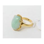 An 18ct gold and jade panel ring, approx. ring size L
