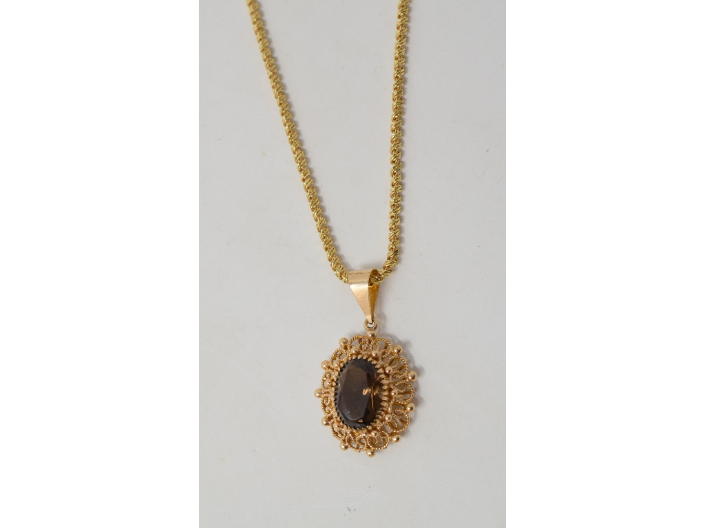 An 18ct gold fancy link necklace, approx. 16.4 g, with a 14ct gold gem set pendant