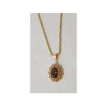 An 18ct gold fancy link necklace, approx. 16.4 g, with a 14ct gold gem set pendant