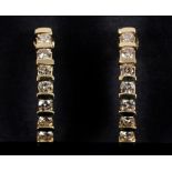 A pair of yellow coloured metal and diamond hoop earrings See illustration Report by NG Approx. 5.