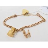 A 9ct gold charm bracelet, with a 9ct gold Toby jug and a 9ct gold fisherman charm, approx. 18.8 g