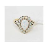 A 9ct gold and Gilson opal ring, with central tear drop stone, approx. ring size Q Report by NG