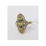 A 9ct gold, peridot and pearl ring, approx. ring size P½ Report by NG Modern